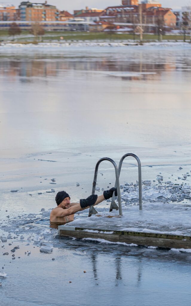 Photo by Olavi Anttila: https://www.pexels.com/photo/man-in-frozen-lake-14815626/